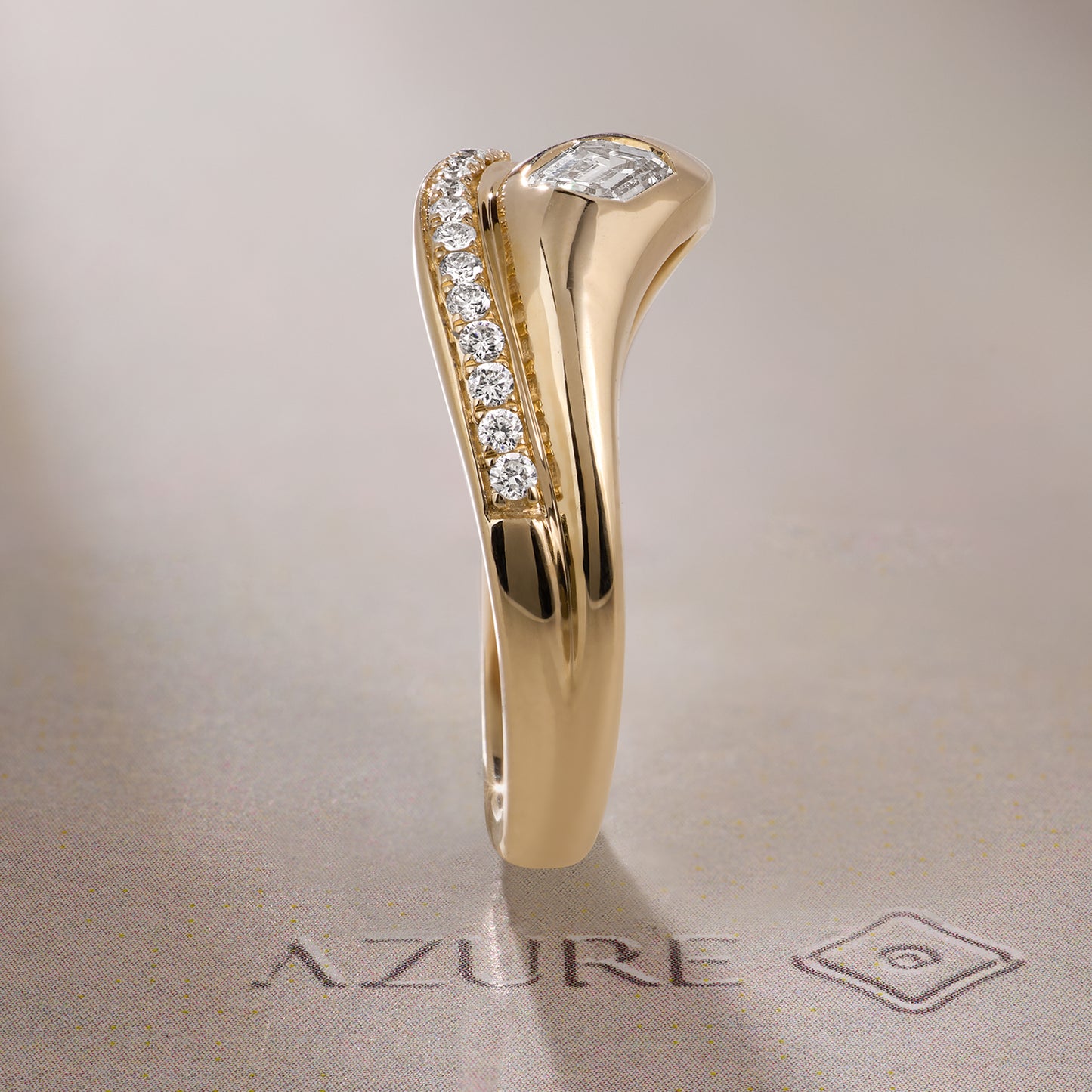 Emerald-Cut and Round Diamond Ring