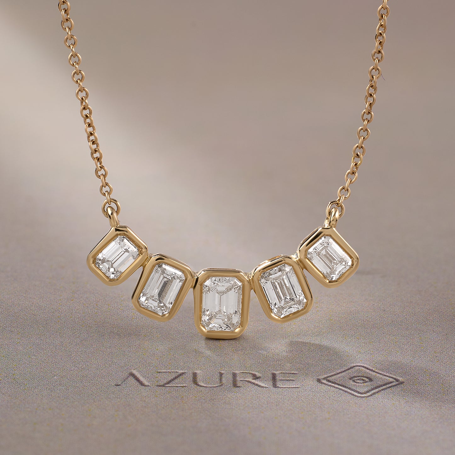 Graduated Emerald Cut Diamond Pendant