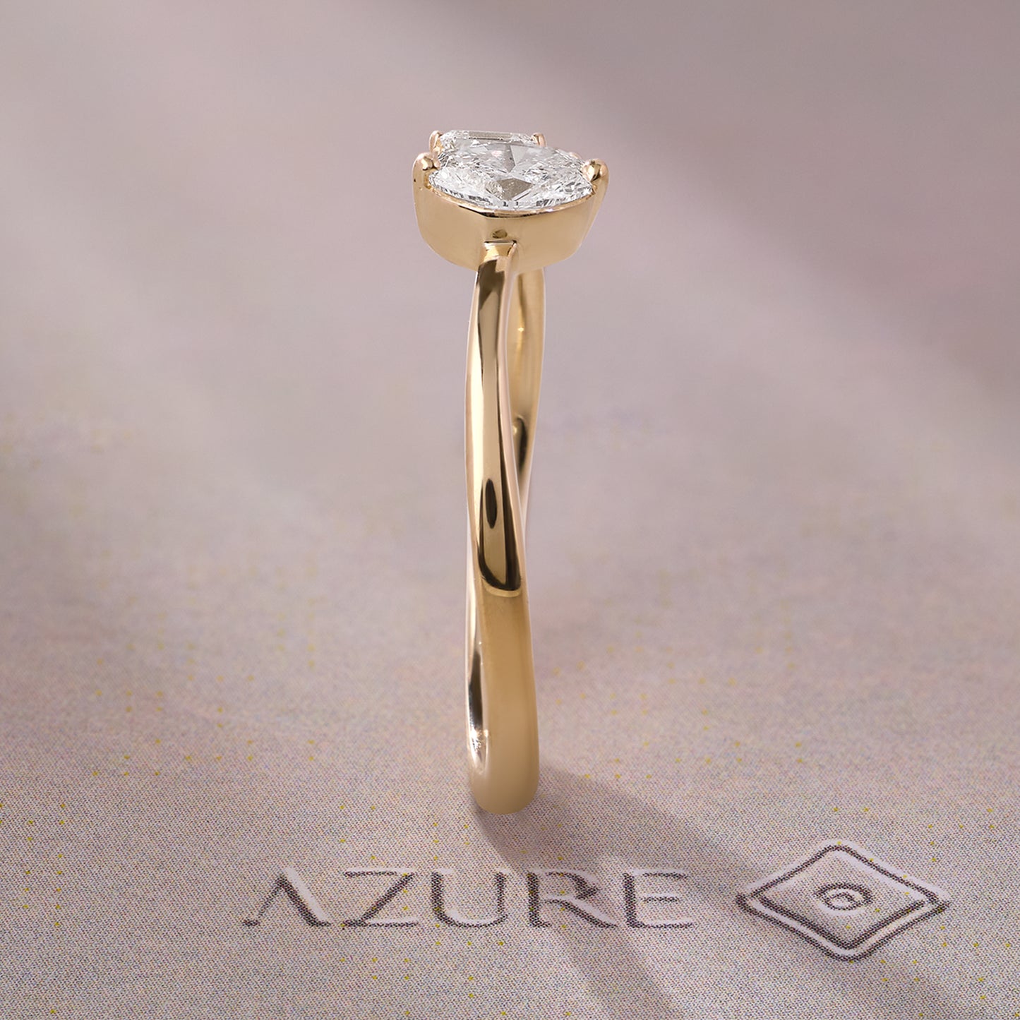 Oval and Emerald-cut Diamond Ring