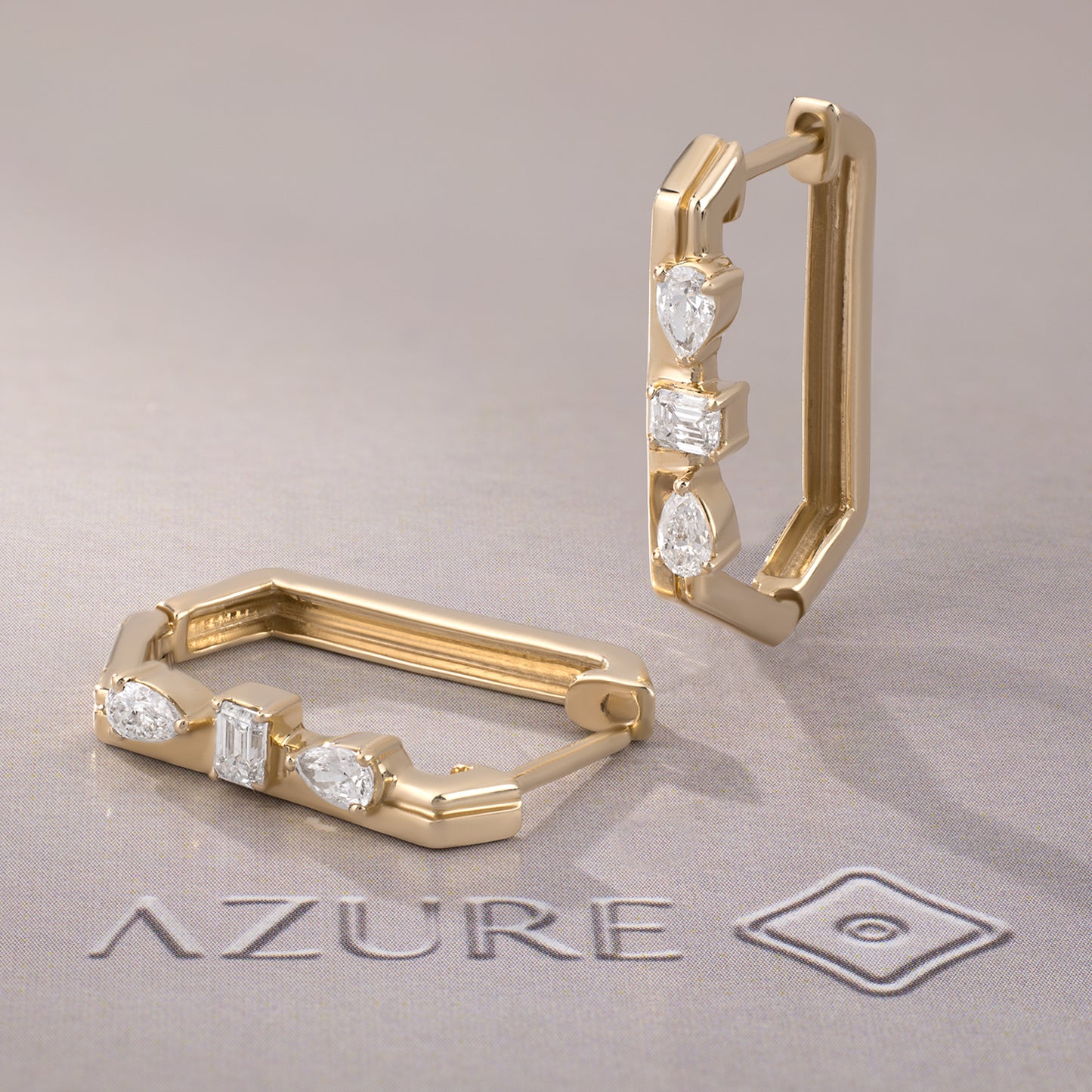 Emerald-Cut And Pear Diamond Earrings