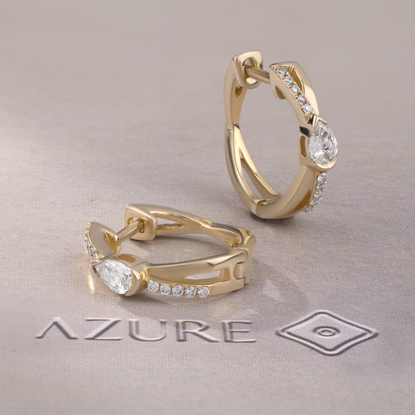 Pear And Round Diamond Earrings