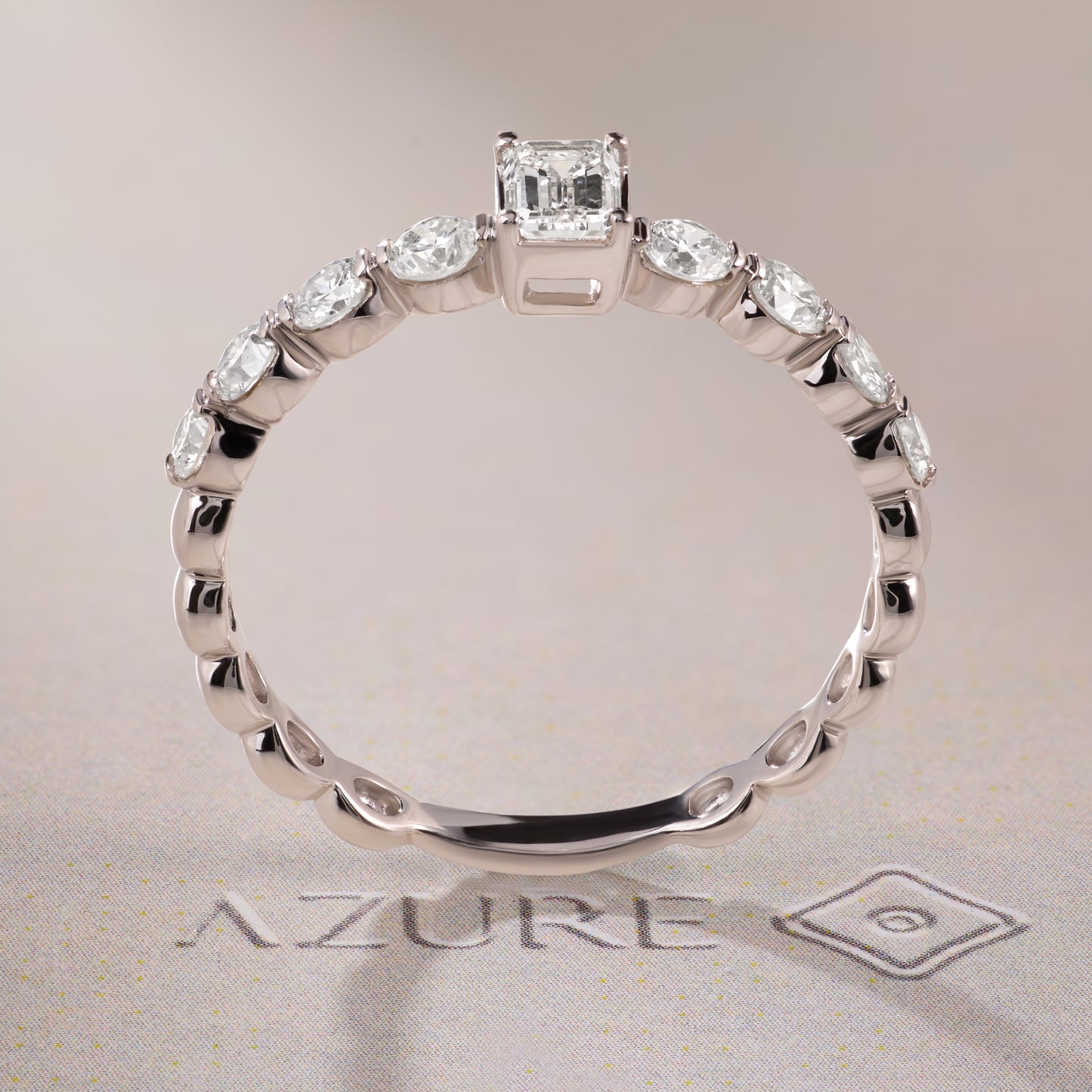 Emerald-Cut & Round Diamond Ring