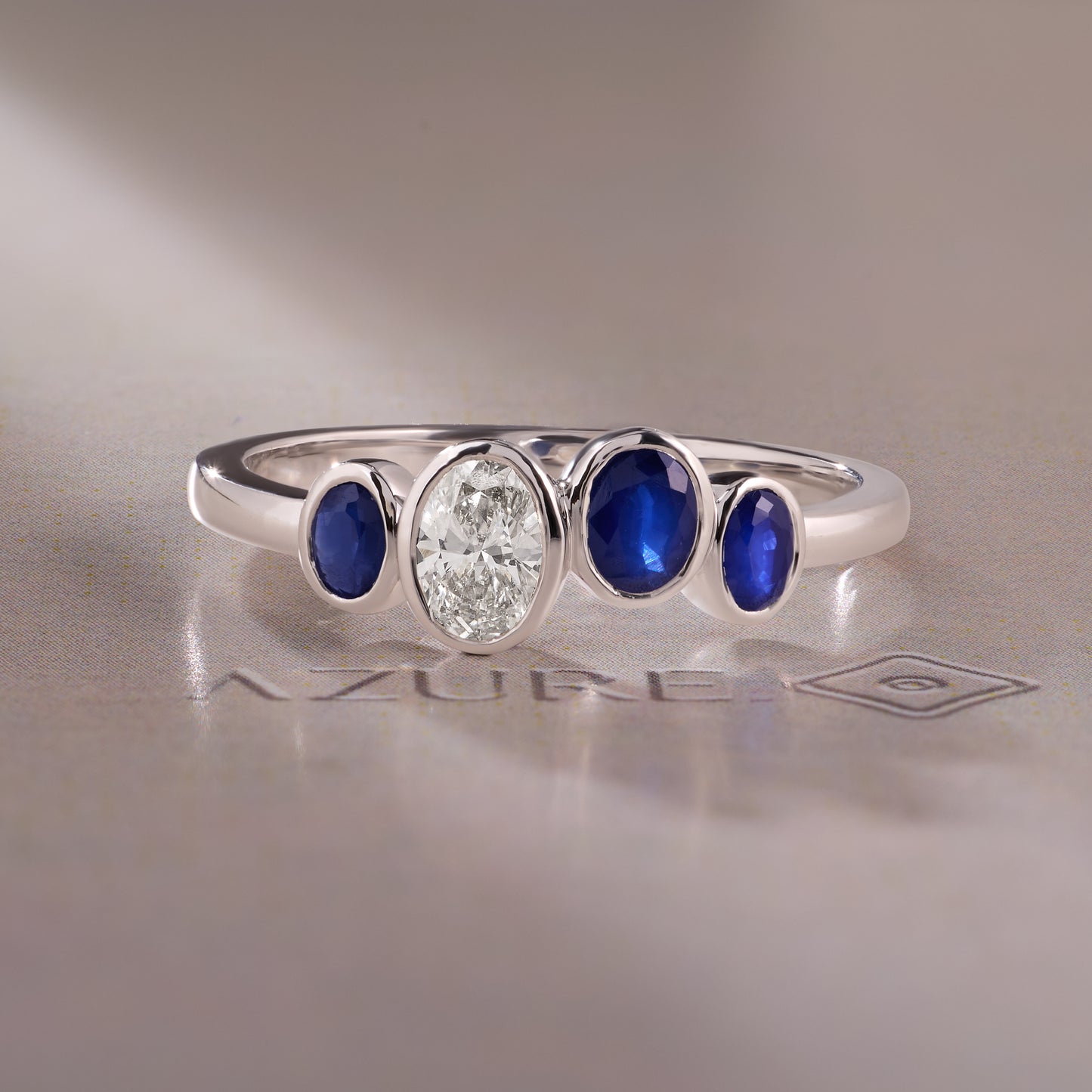 Oval Diamond & Blue Sapphire Ring