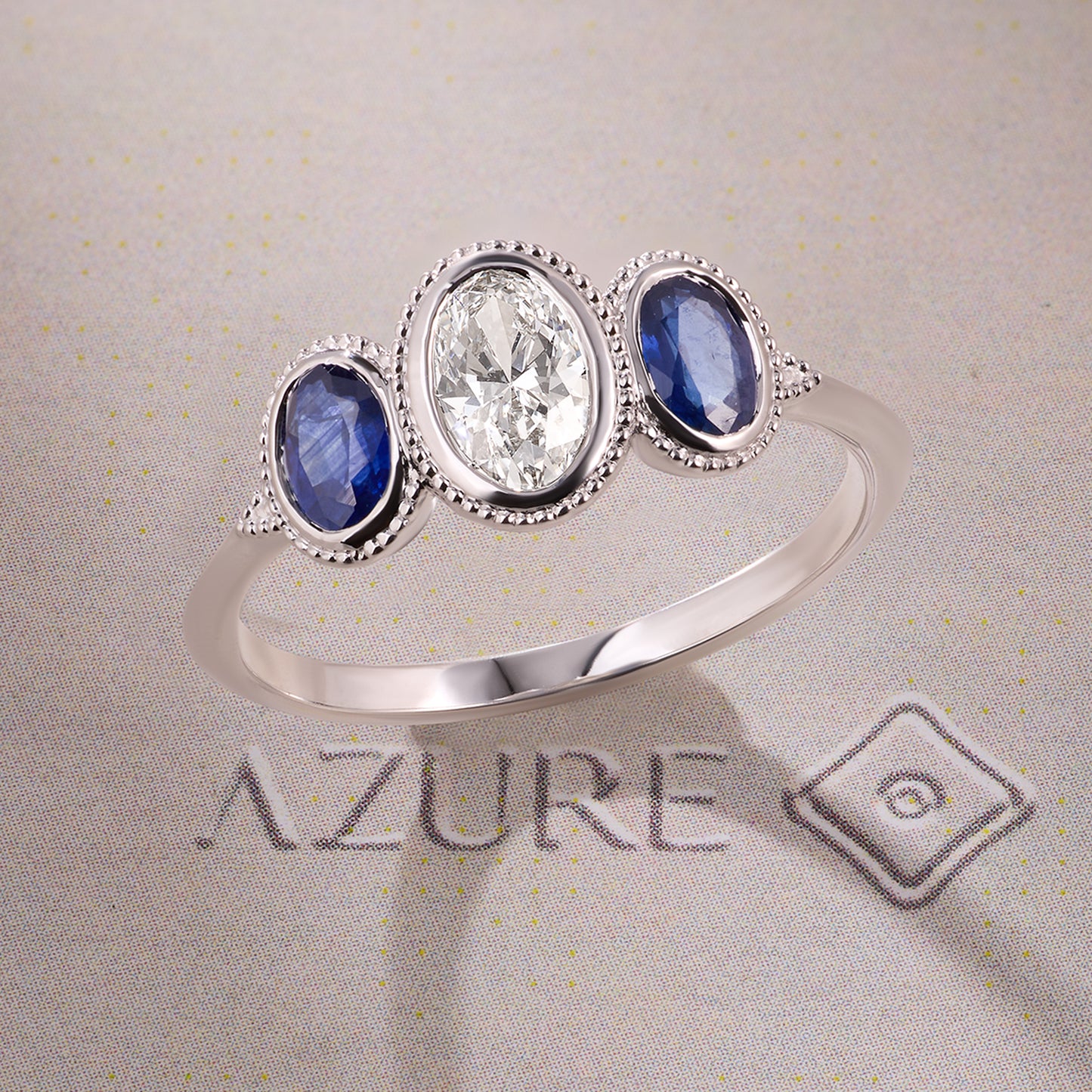 Oval Diamonds & Blue Sapphire Ring