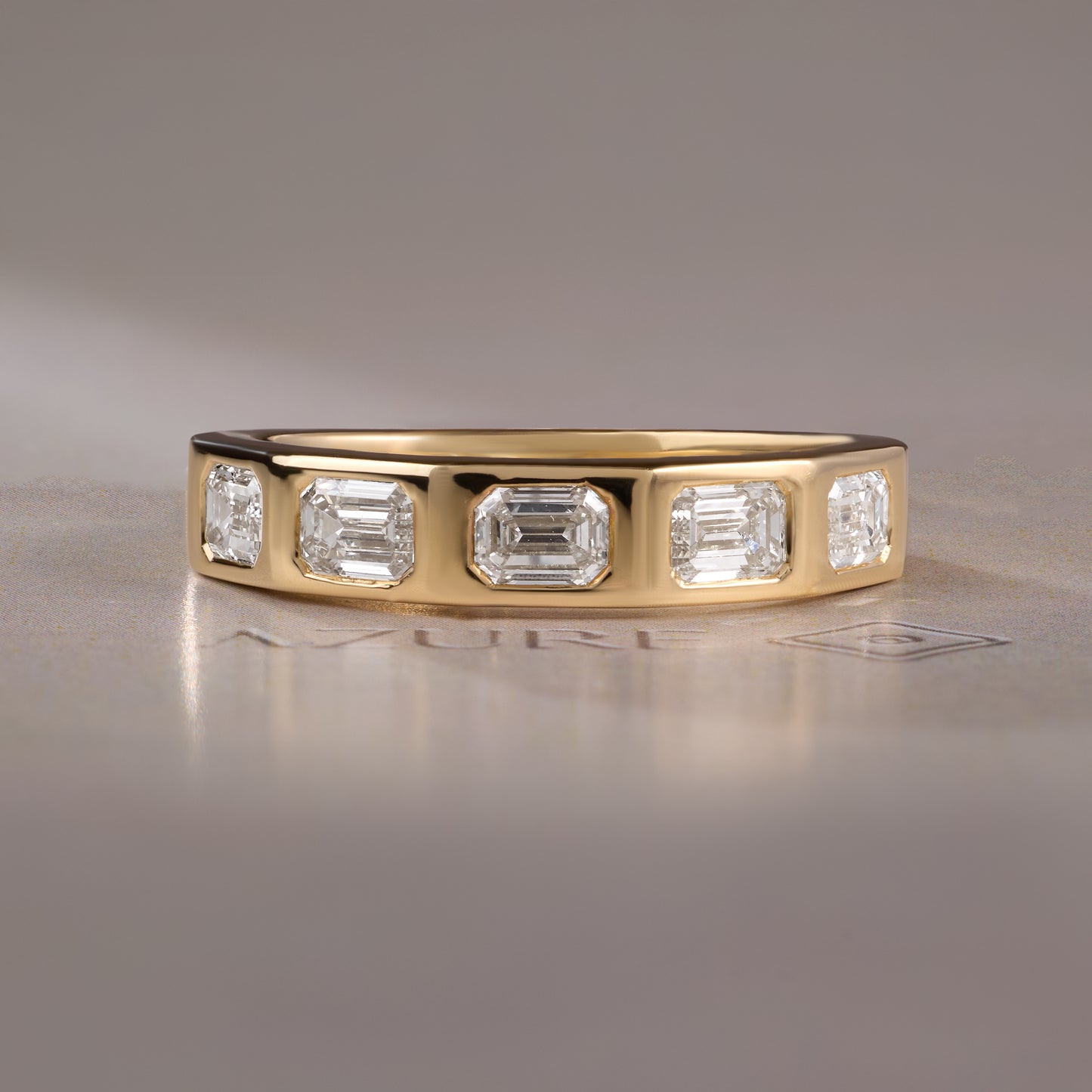 Emerald-Cut Diamond Channel Ring