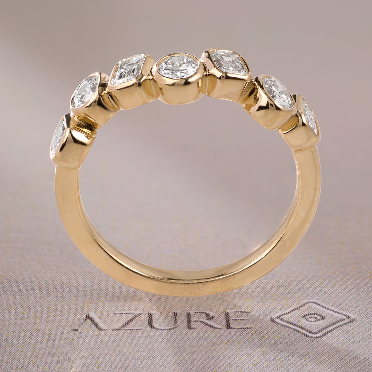 Emerald-Cut and Oval Diamond Ring