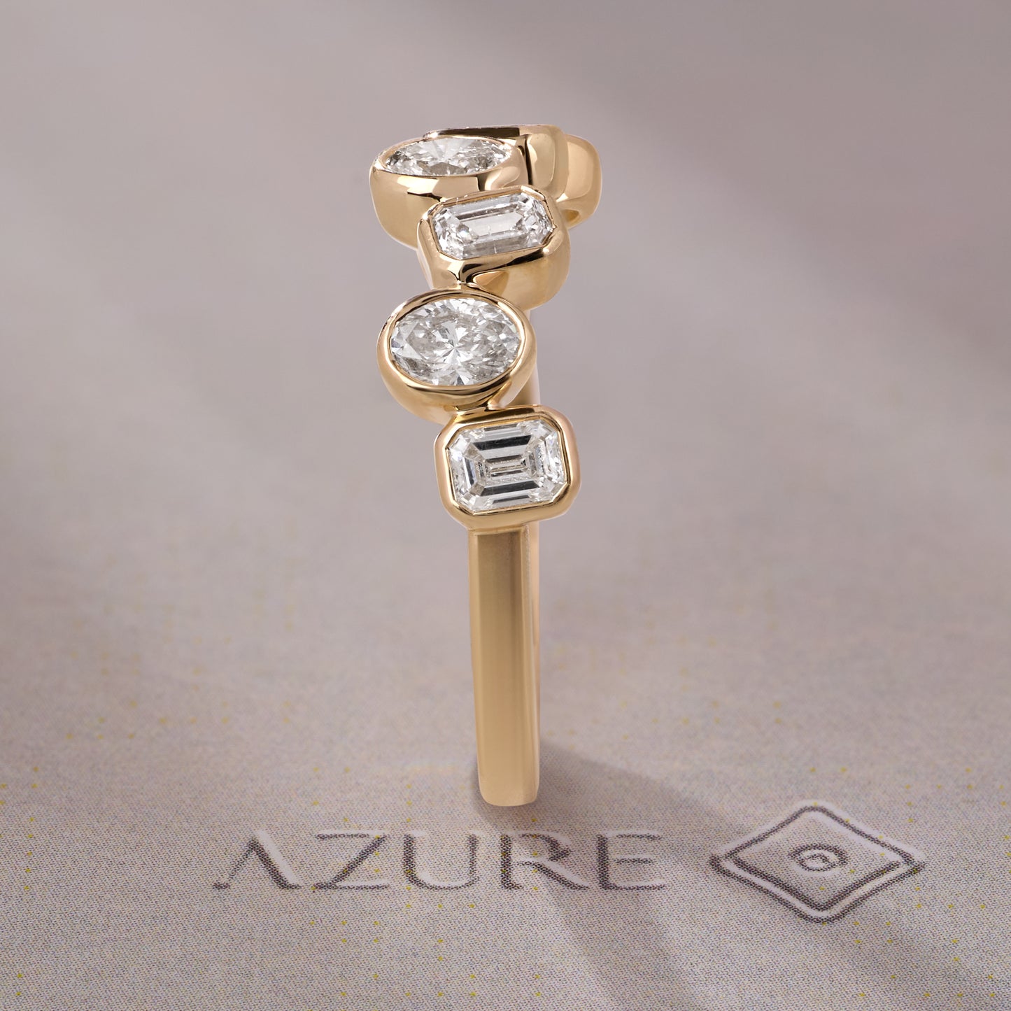 Emerald-Cut and Oval Diamond Ring