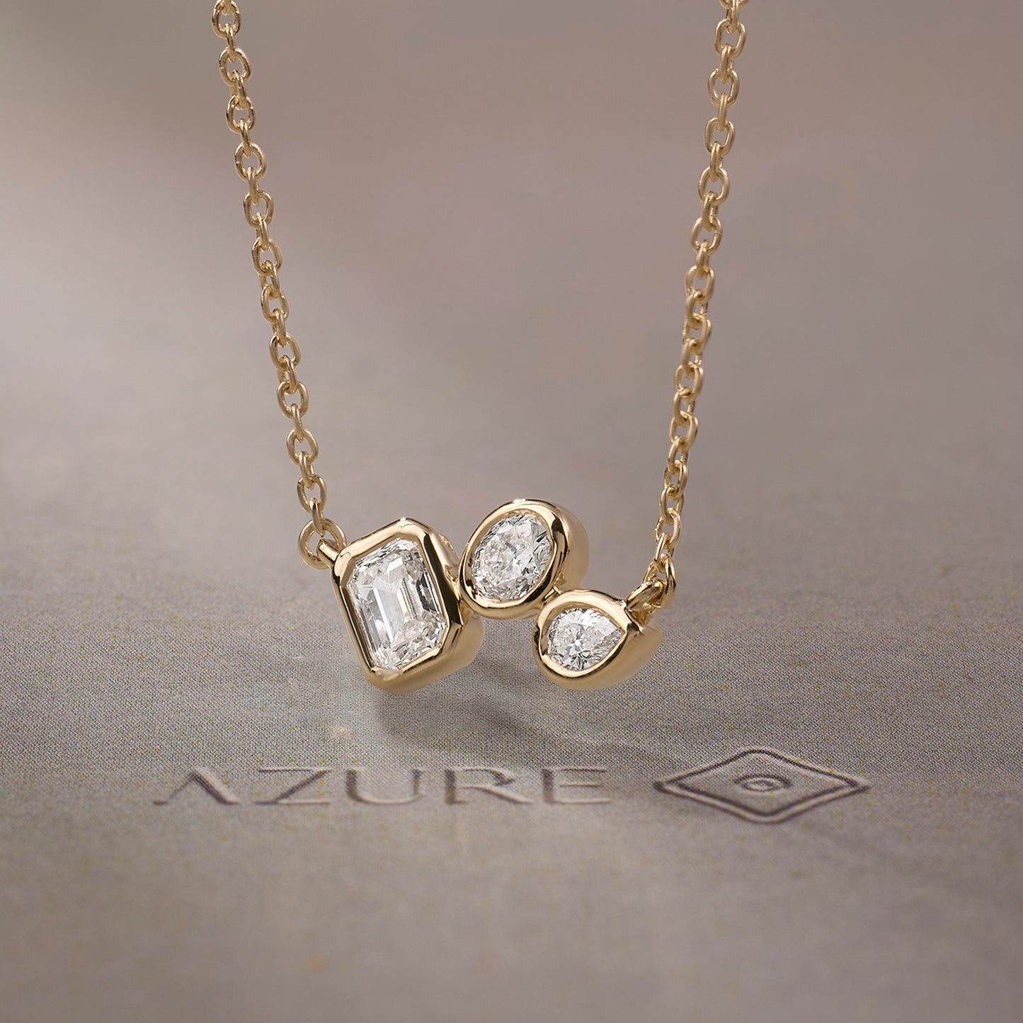 Emerald-Cut, Oval & Pear Asymmetric Pendant