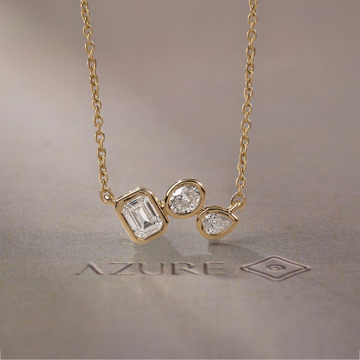 Emerald-Cut, Oval & Pear Asymmetric Pendant