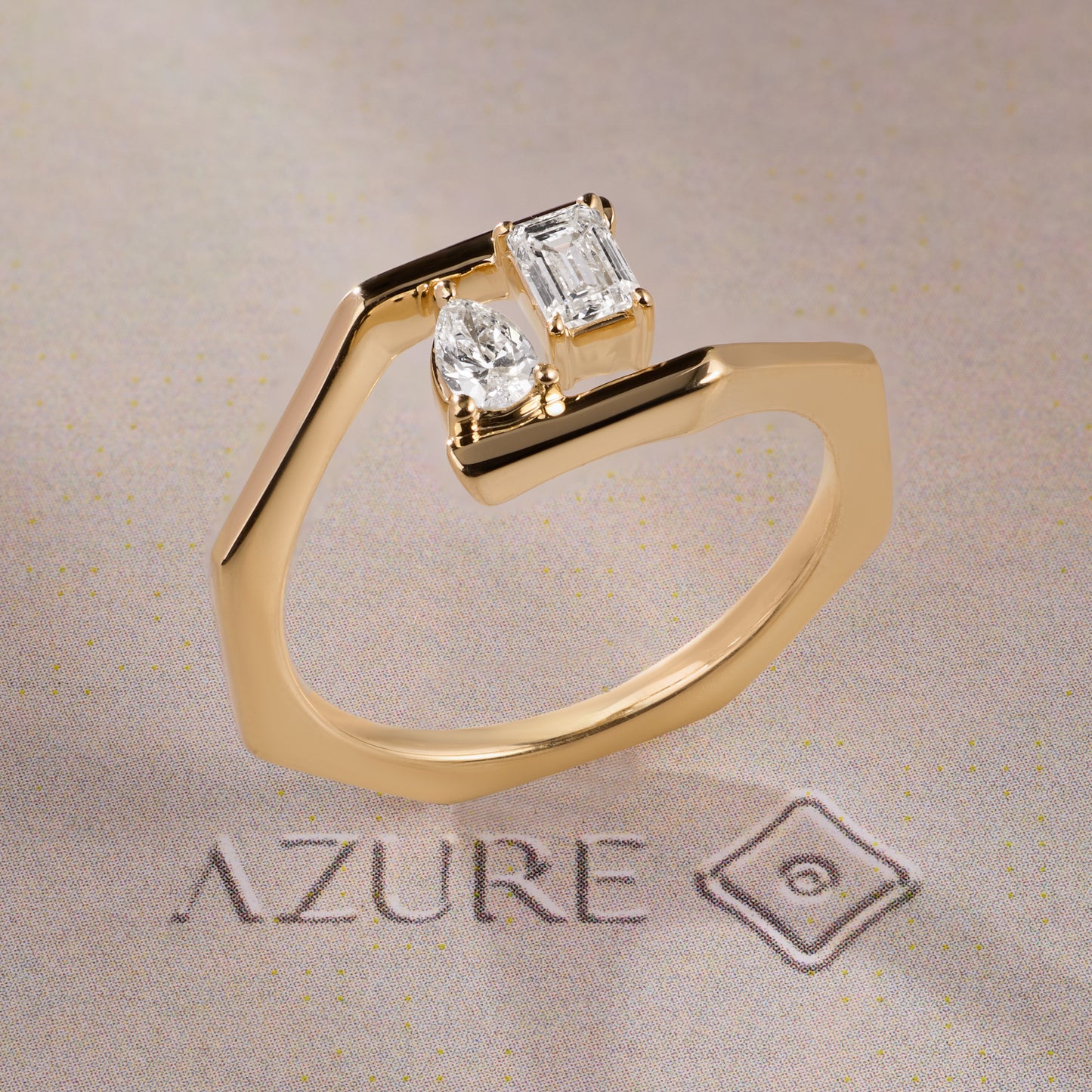 Emerald-Cut and Pear Diamond Ring