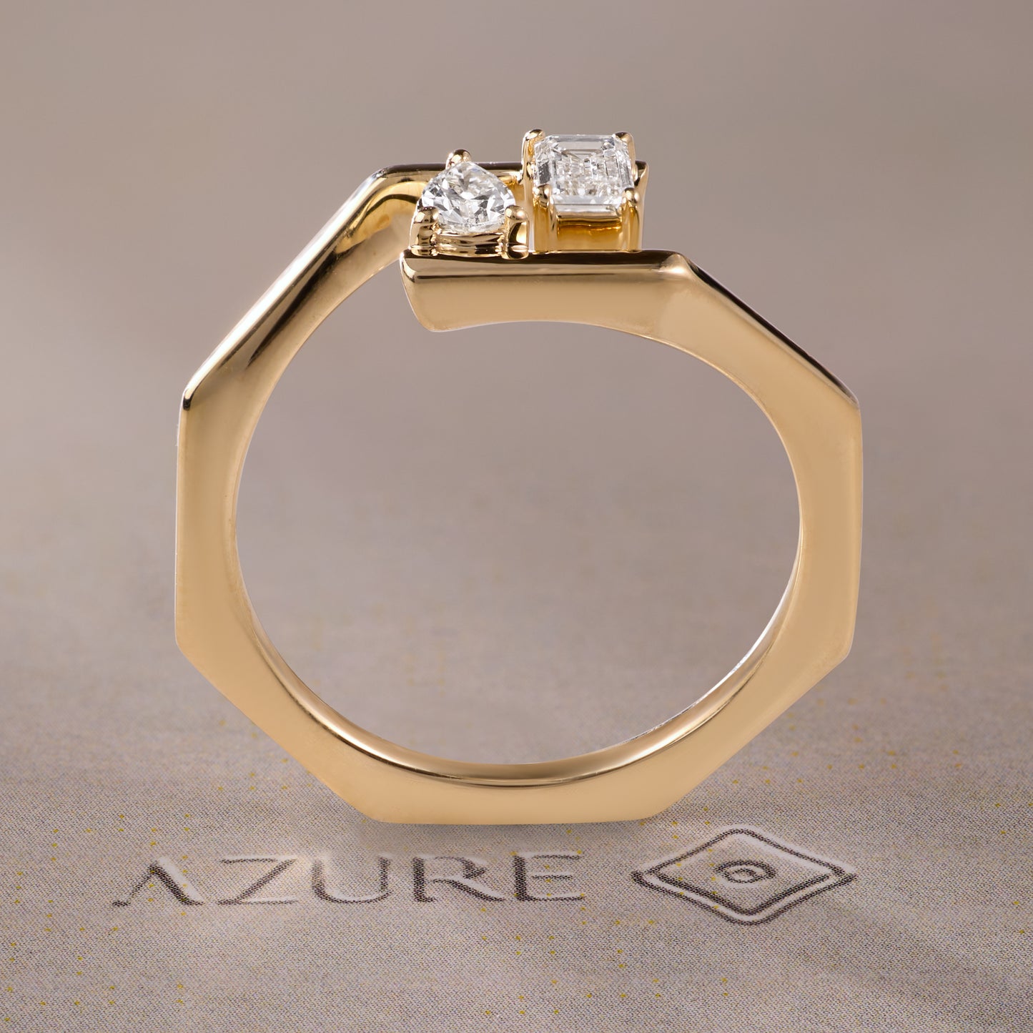 Emerald-Cut and Pear Diamond Ring