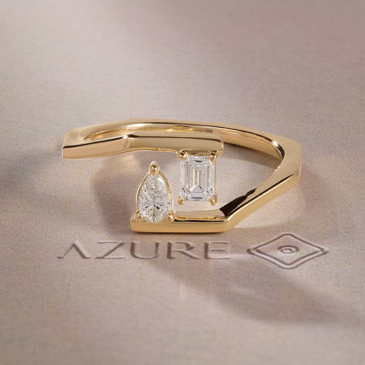 Emerald-Cut and Pear Diamond Ring