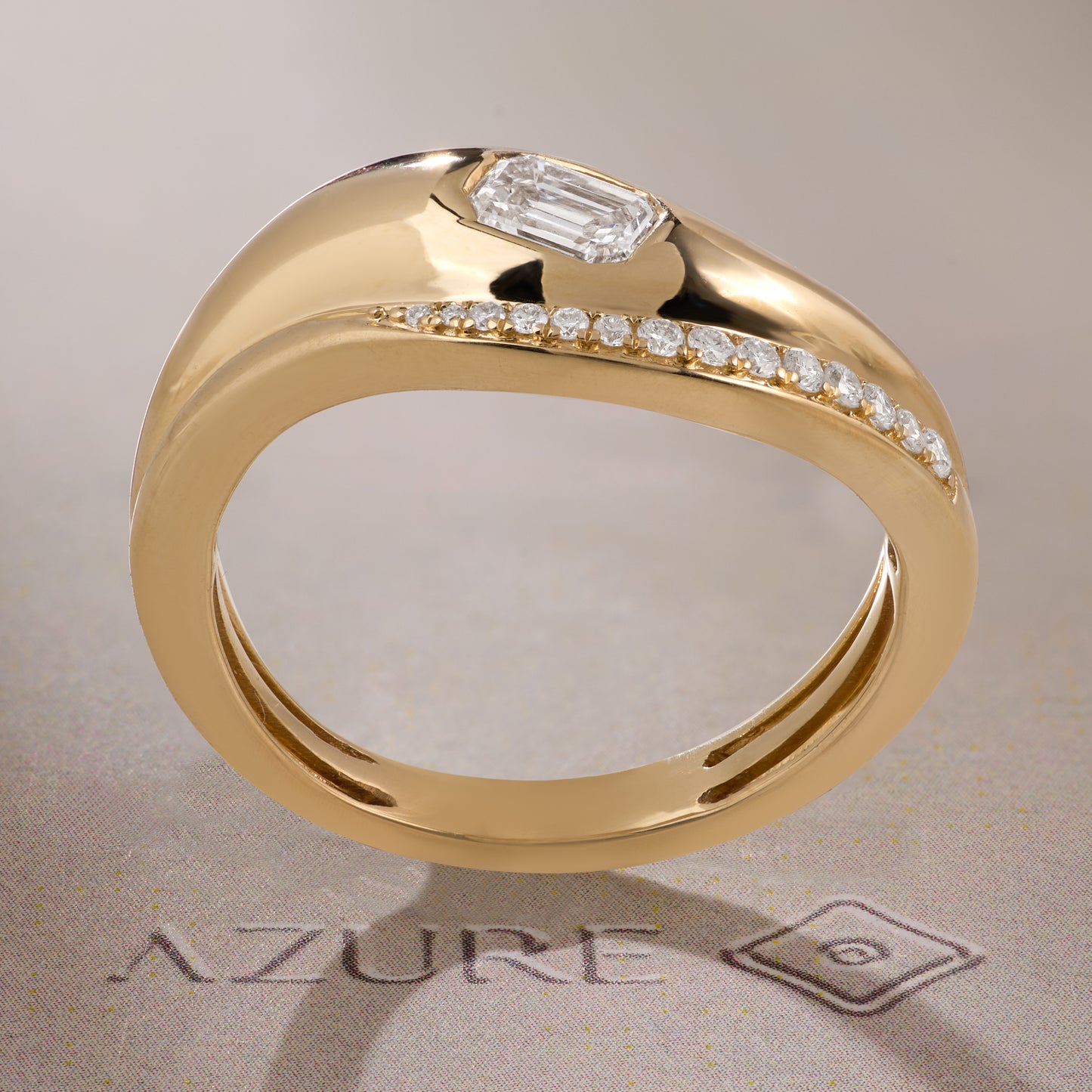 Emerald-Cut and Round Diamond Ring
