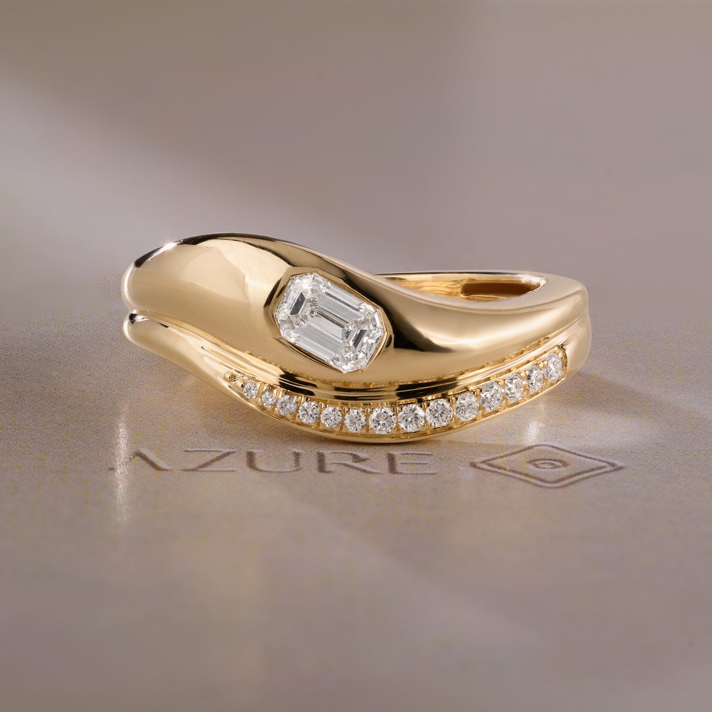 Emerald-Cut and Round Diamond Ring