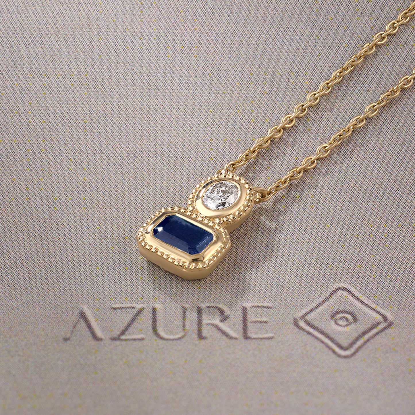 Oval Diamond & Emerald-Cut Blue Sapphire Milgrain Pendant