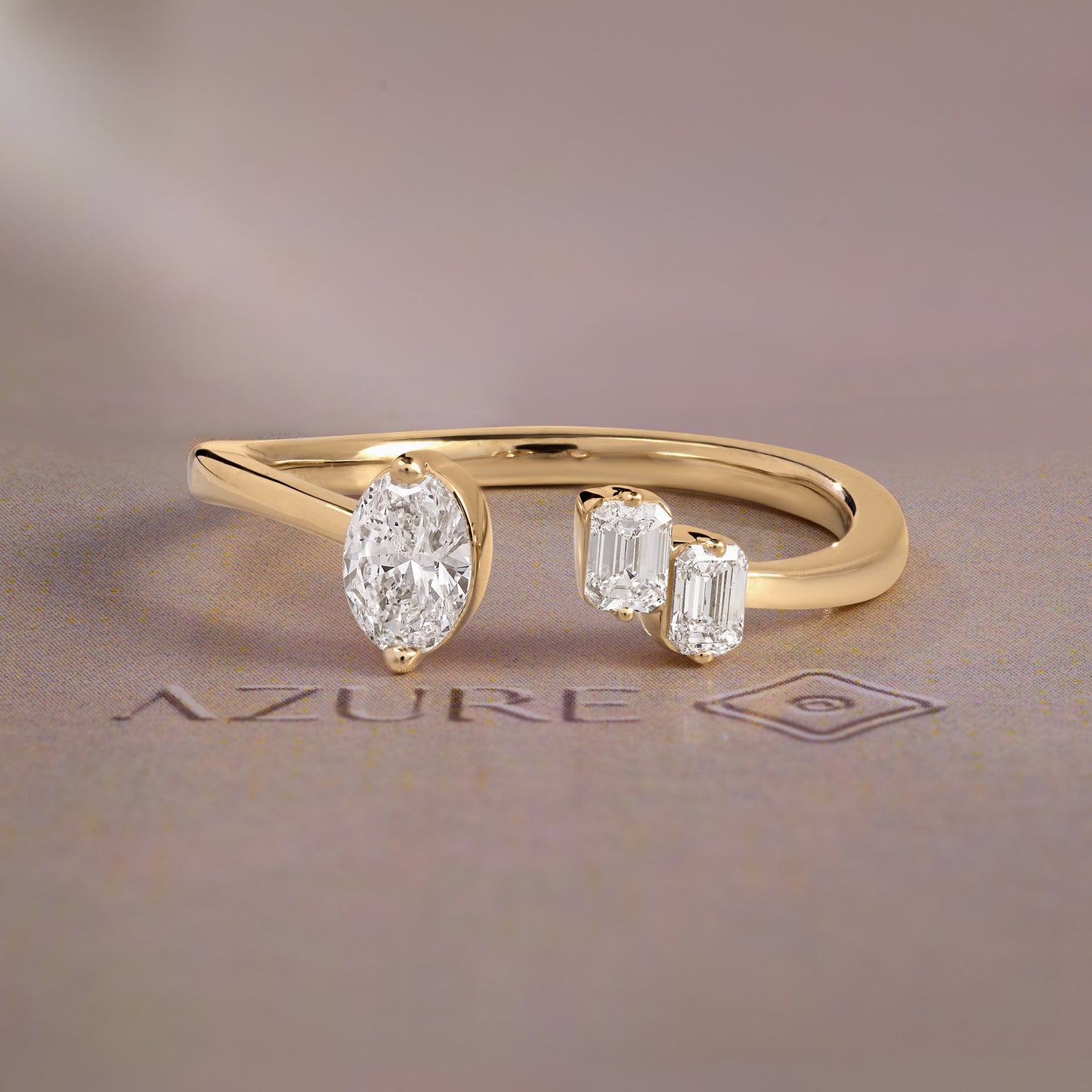 Oval and Emerald-cut Diamond Ring