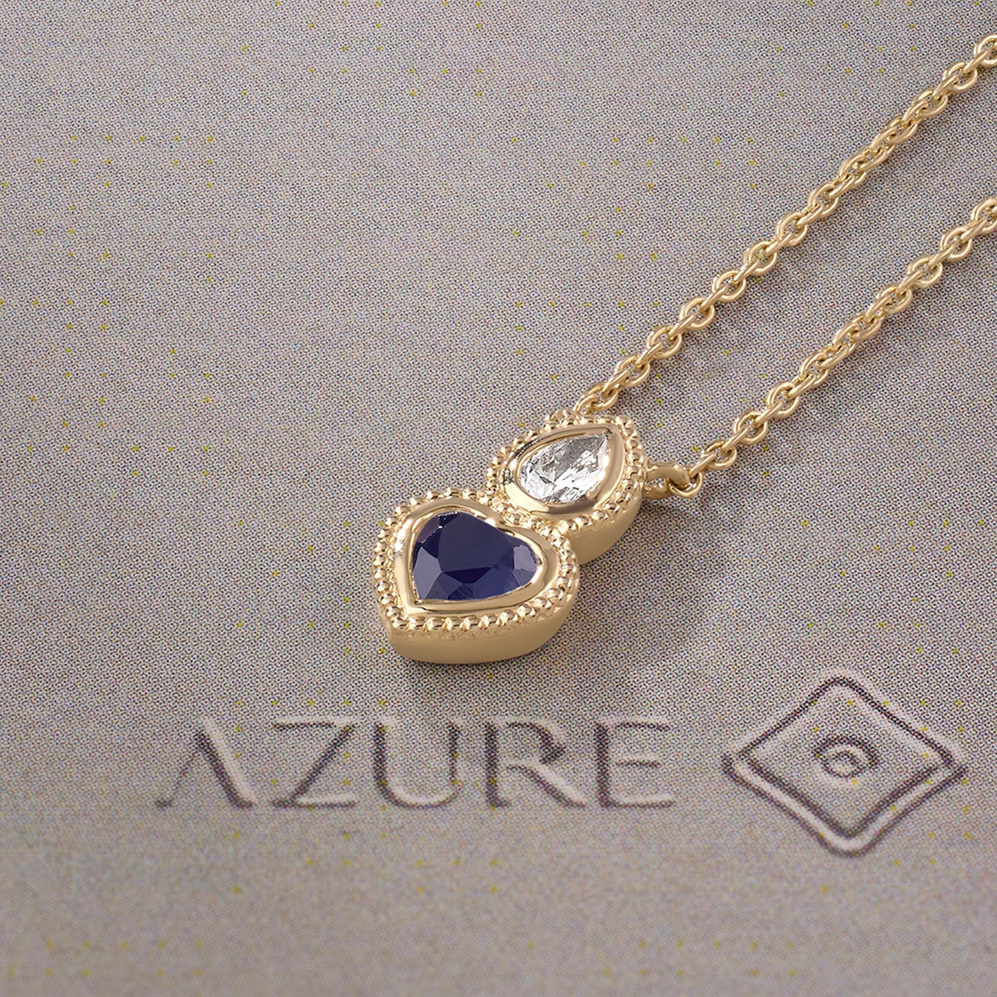 Pear Diamond & Blue Sapphire Heart Pendant