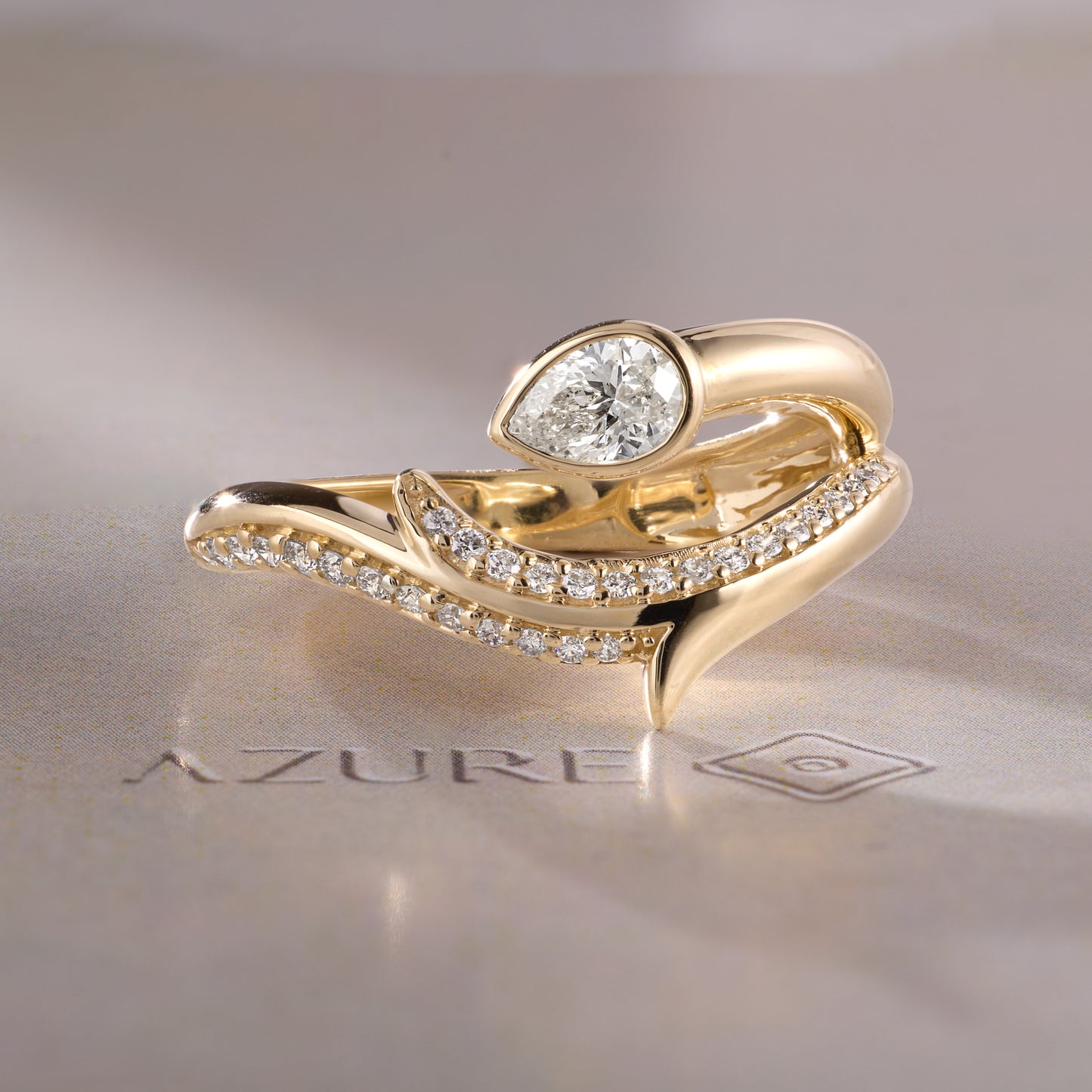 Pear & Round Diamond Ring