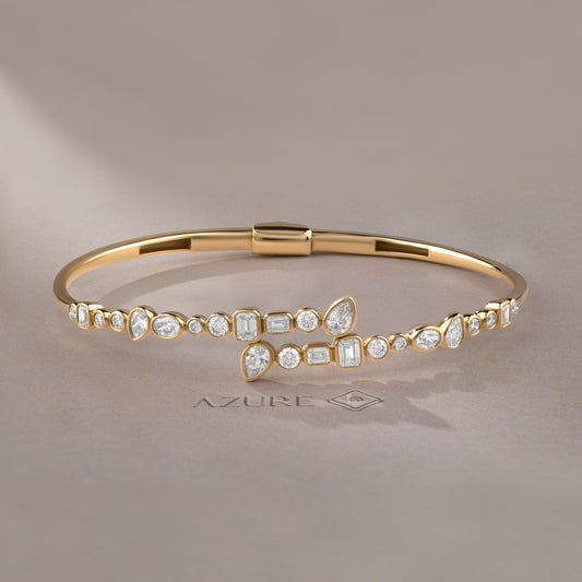Emerald, Round, Oval And Pear Diamond Bangle