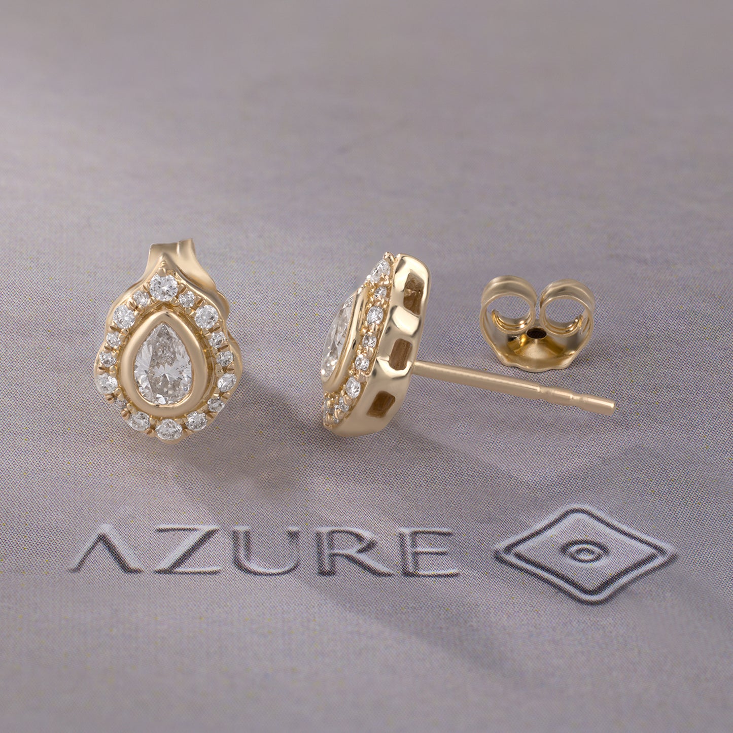 Pear And Round Diamond Earrings