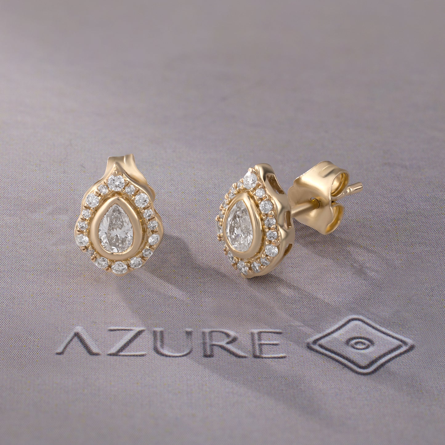 Pear And Round Diamond Earrings