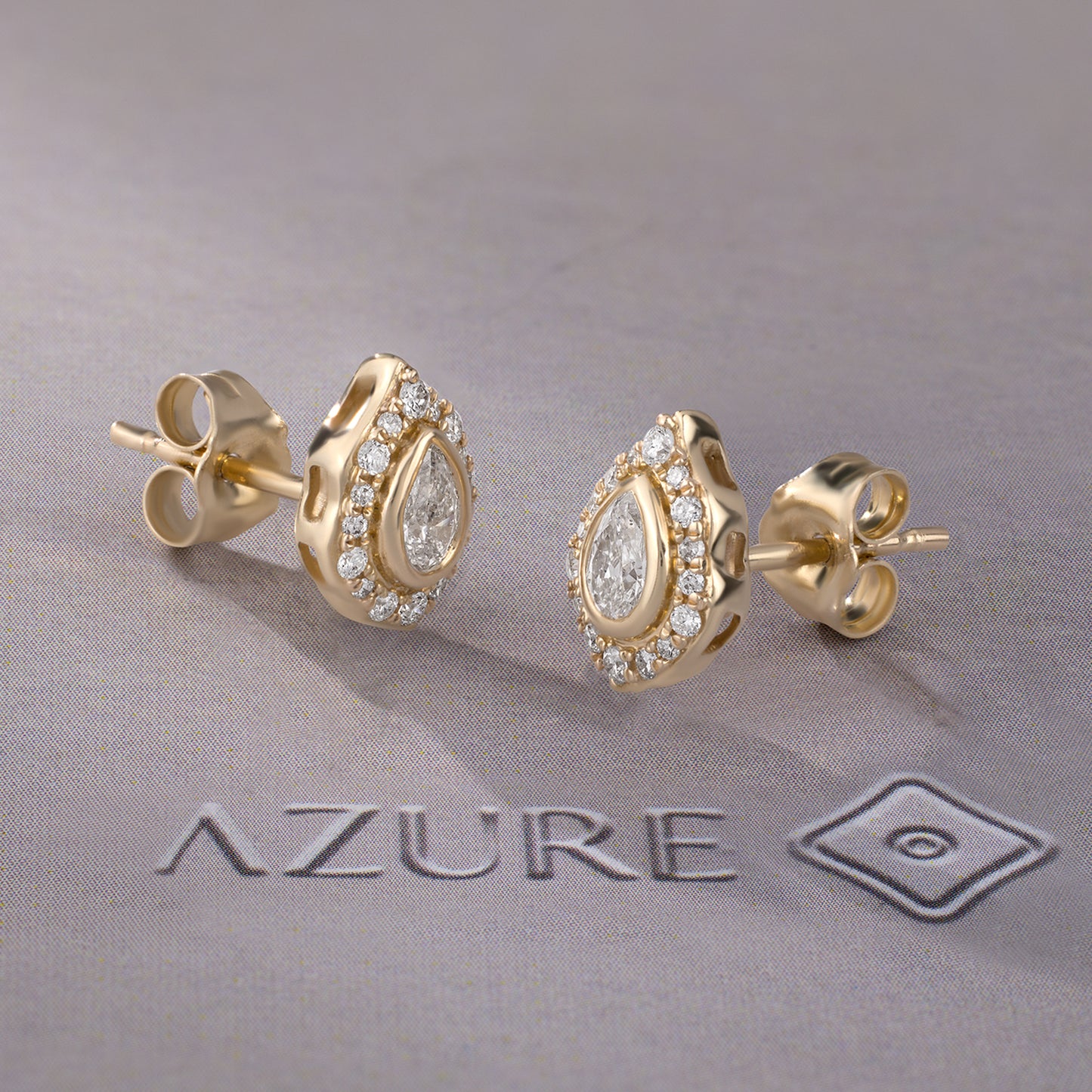 Pear And Round Diamond Earrings