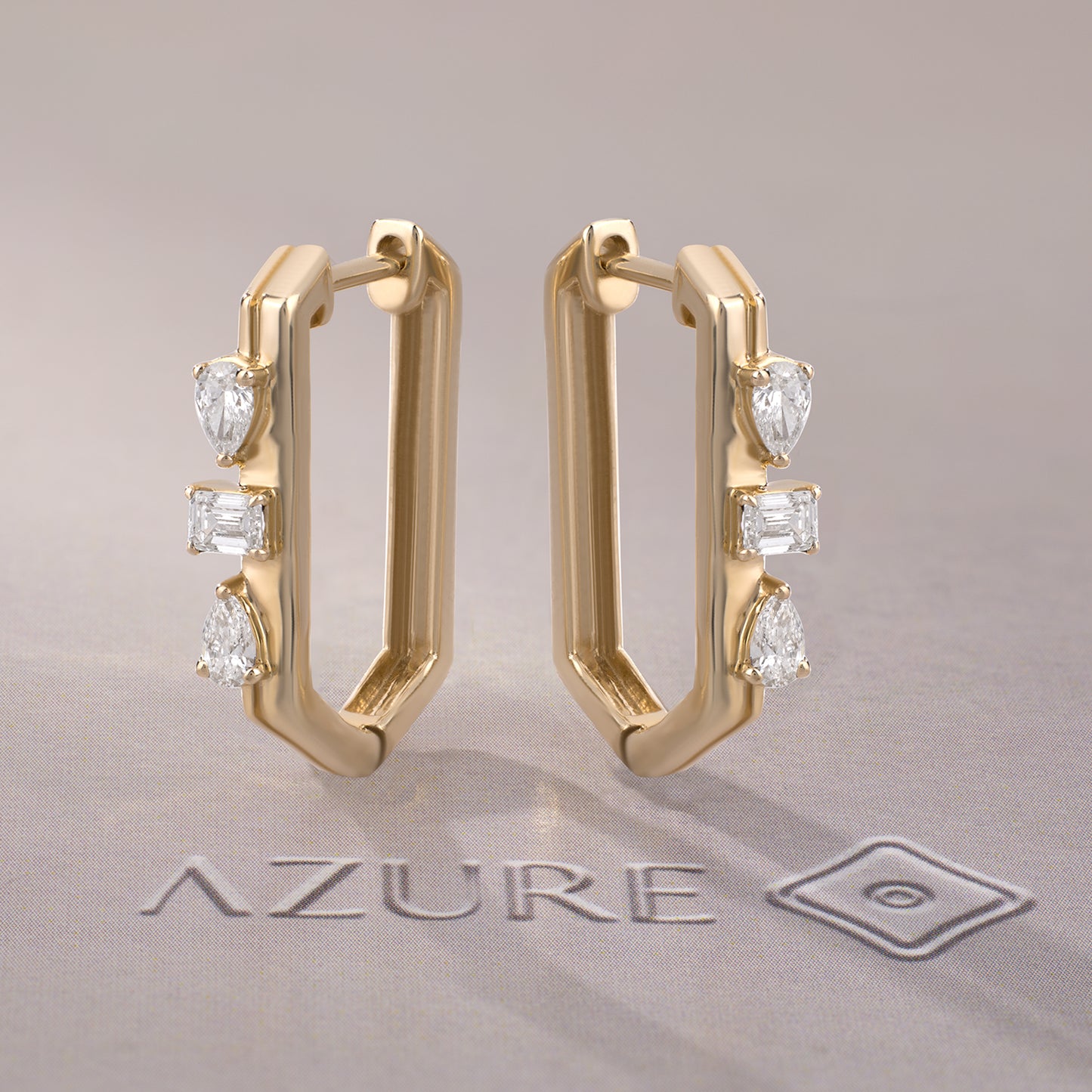 Emerald-Cut And Pear Diamond Earrings