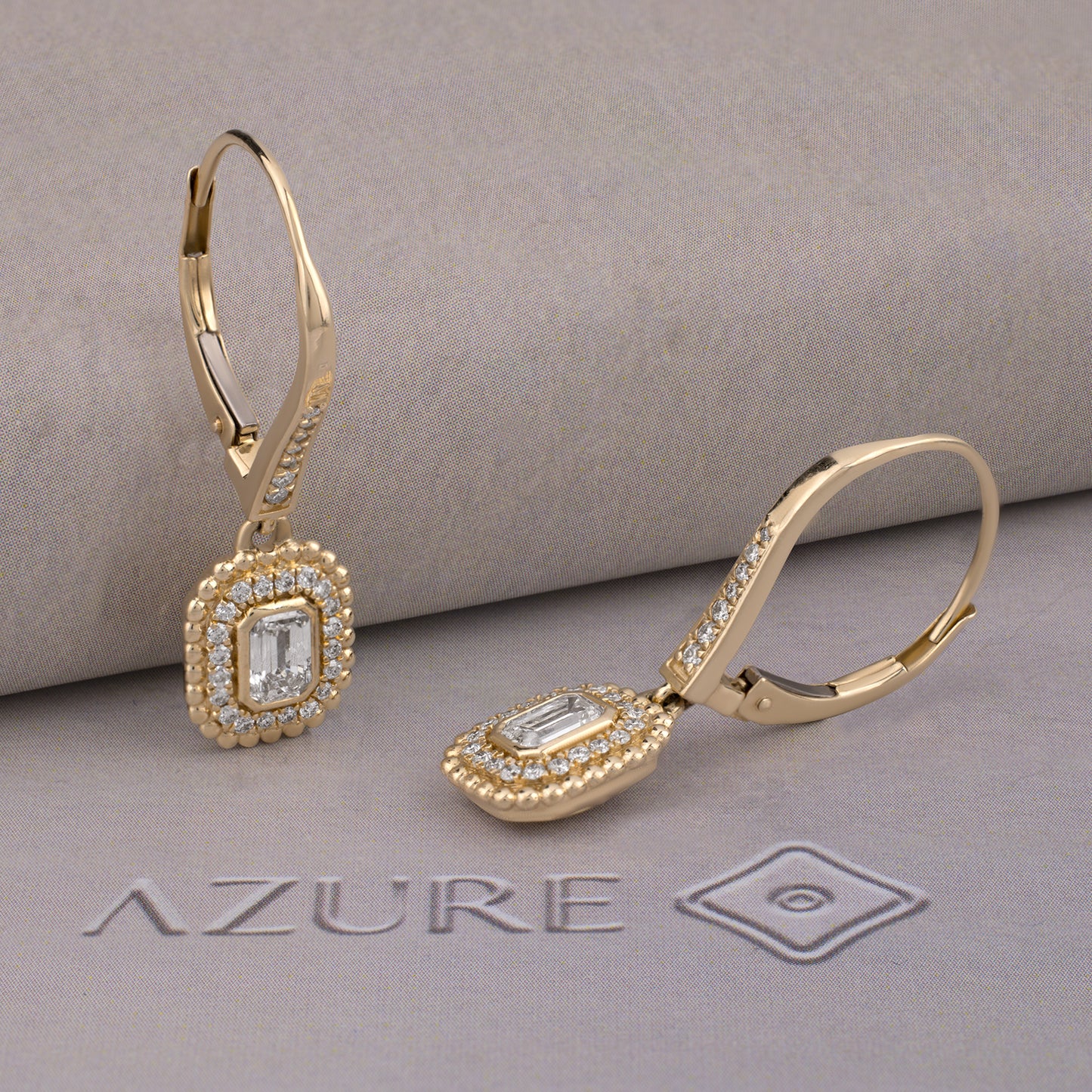 Emerald-cut And Round Diamond Earrings
