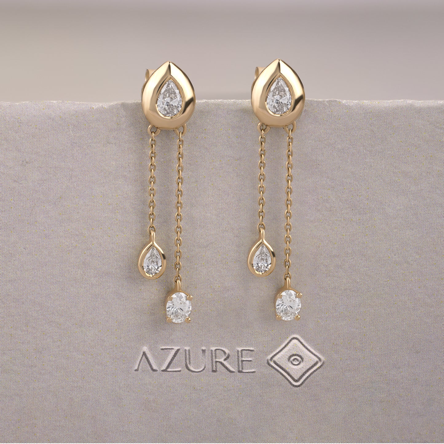Oval And Pear Diamond Earrings