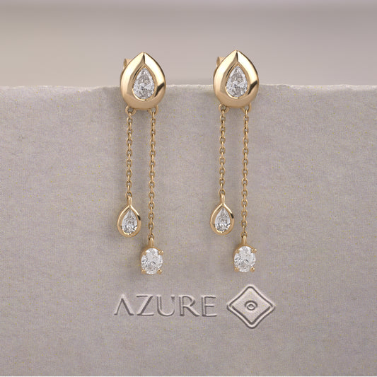 Oval And Pear Diamond Earrings