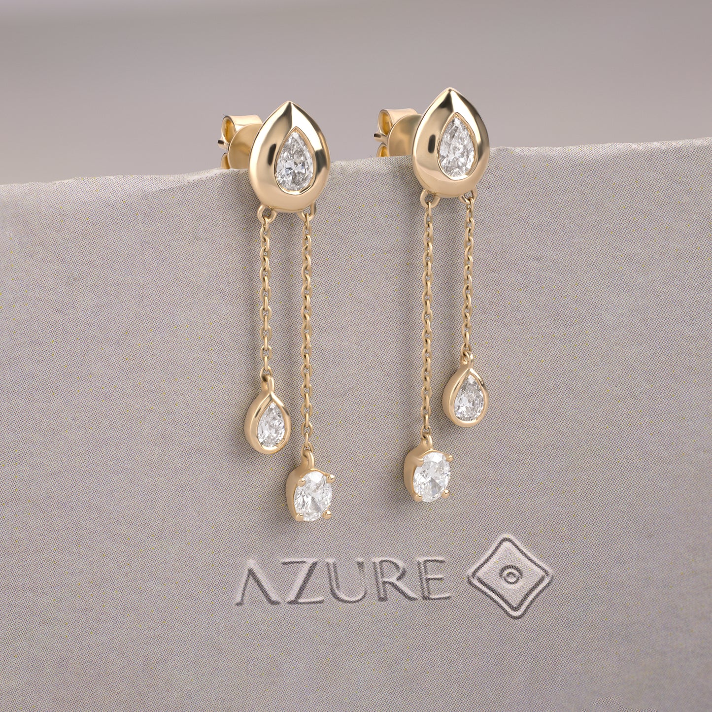 Oval And Pear Diamond Earrings