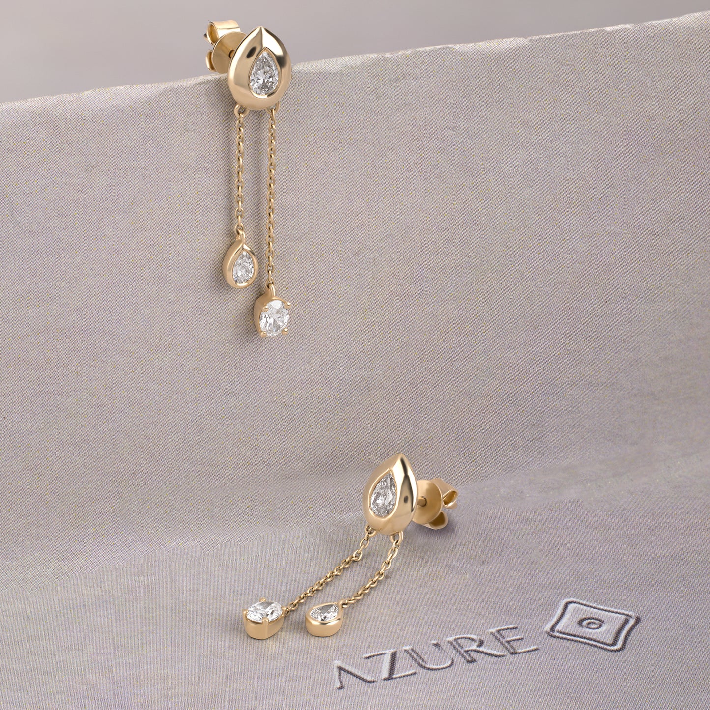 Oval And Pear Diamond Earrings