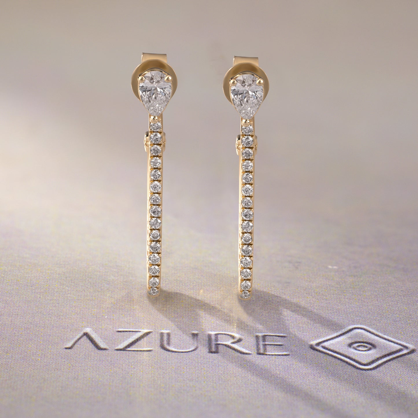 Pear And Round Diamond Earrings