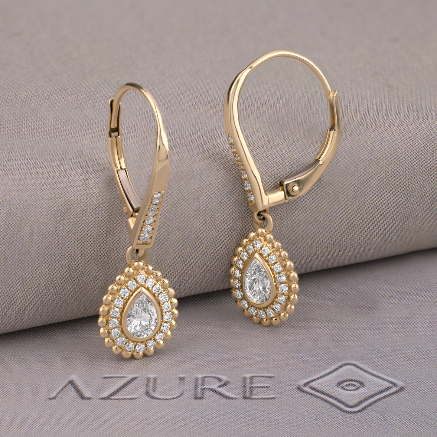 Pear And Round Diamond Earrings