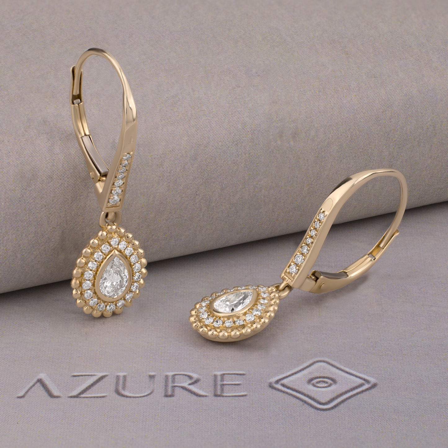 Pear And Round Diamond Earrings