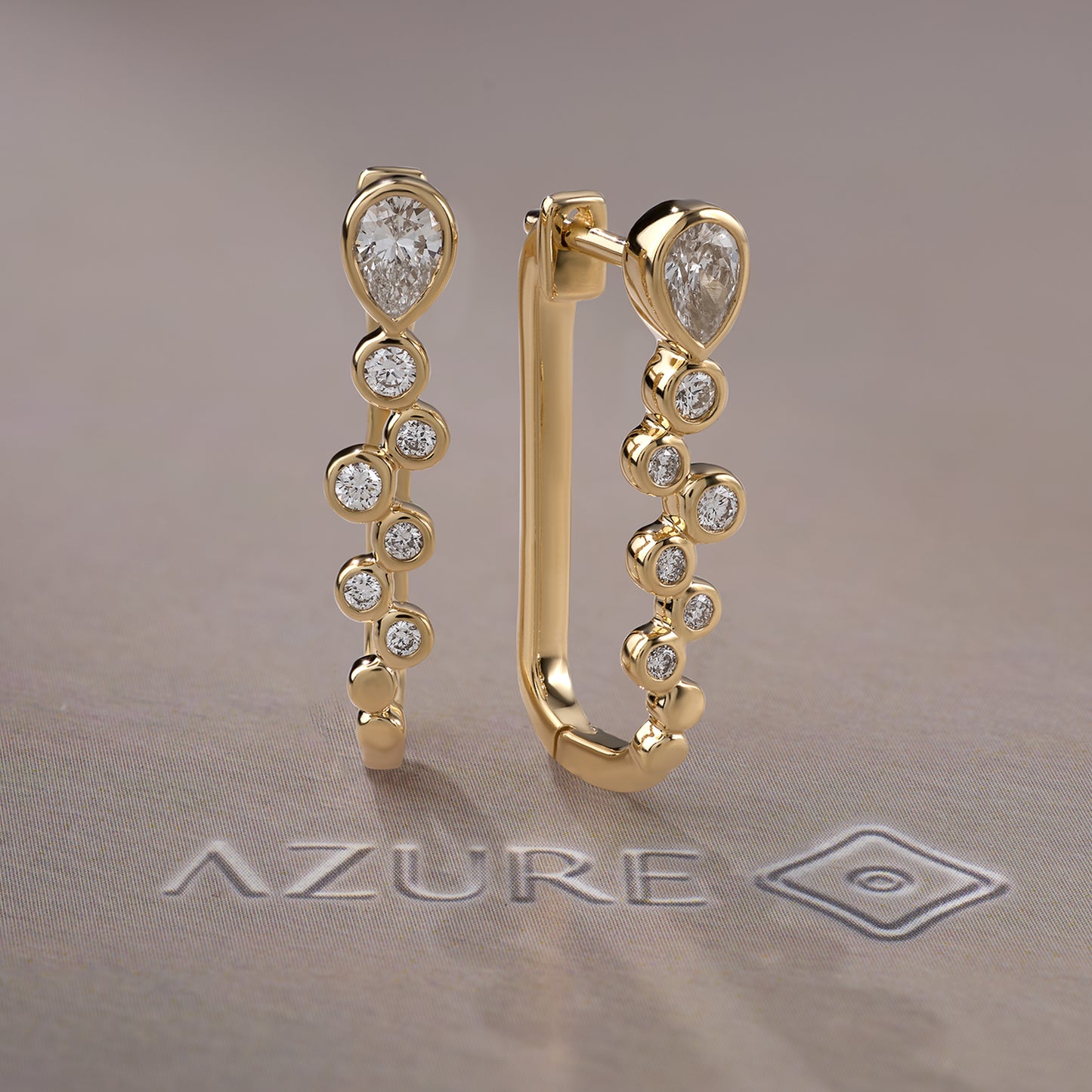 Pear And Round Diamond Earrings