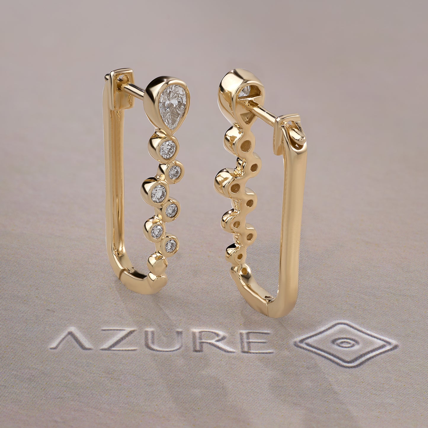 Pear And Round Diamond Earrings