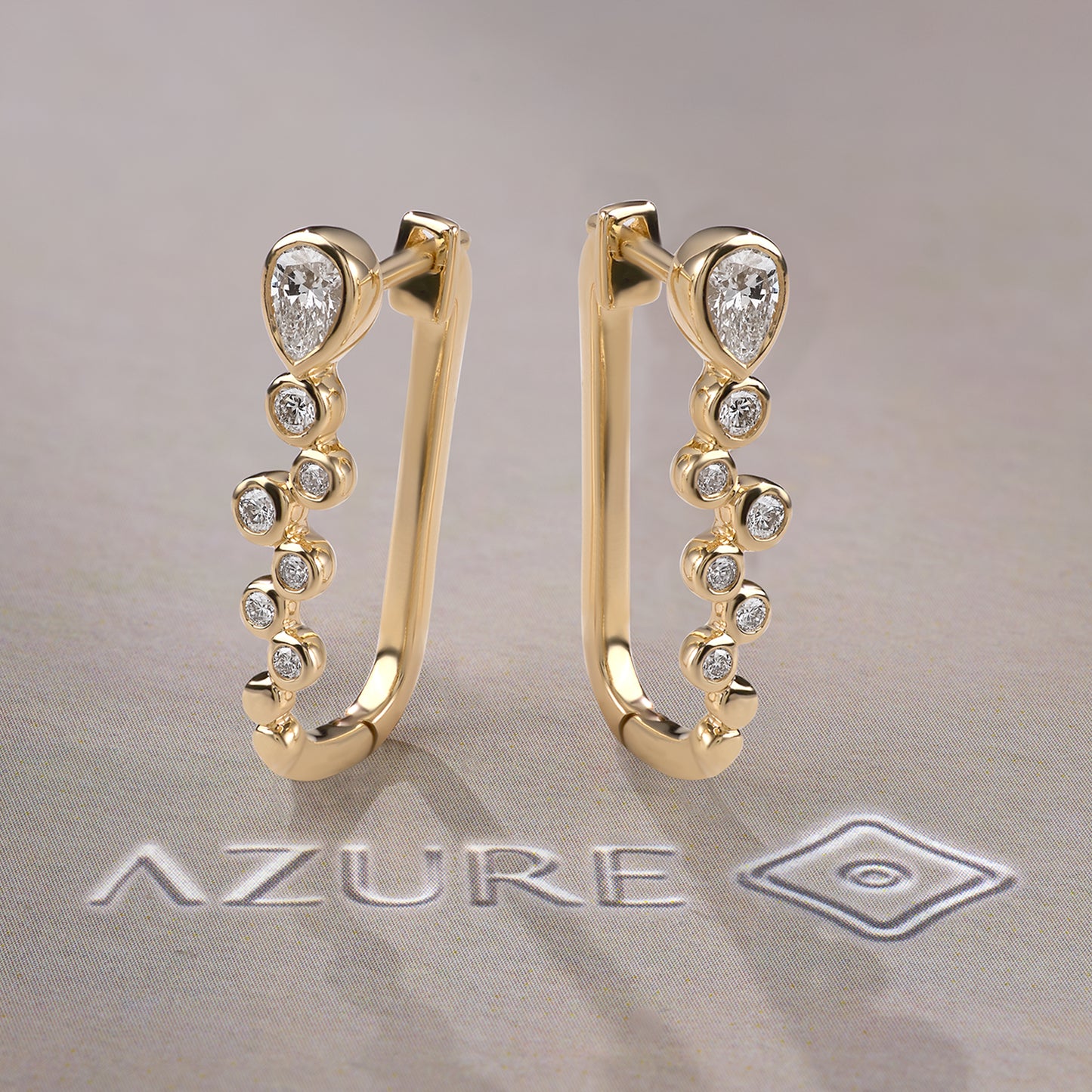 Pear And Round Diamond Earrings